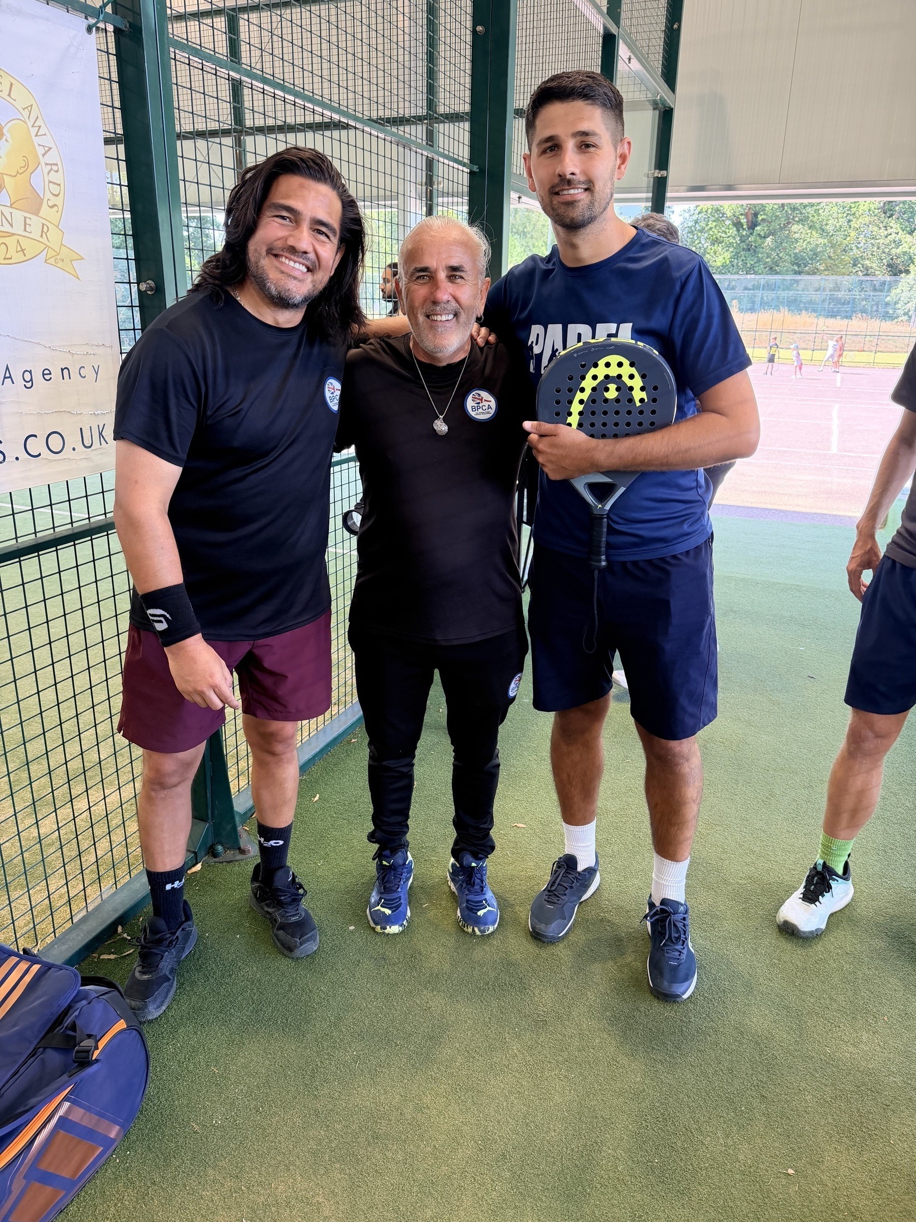 Mark Hunter with padel coaching colleagues at a British Padel Coaches Association event
